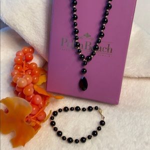 10k gold and genuine onyx necklace and bracelet set.